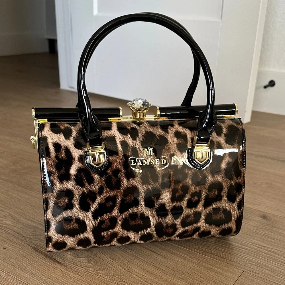 Amazon Leopard Print Satchel with Black and Gold Accents - Picture 1 of 6